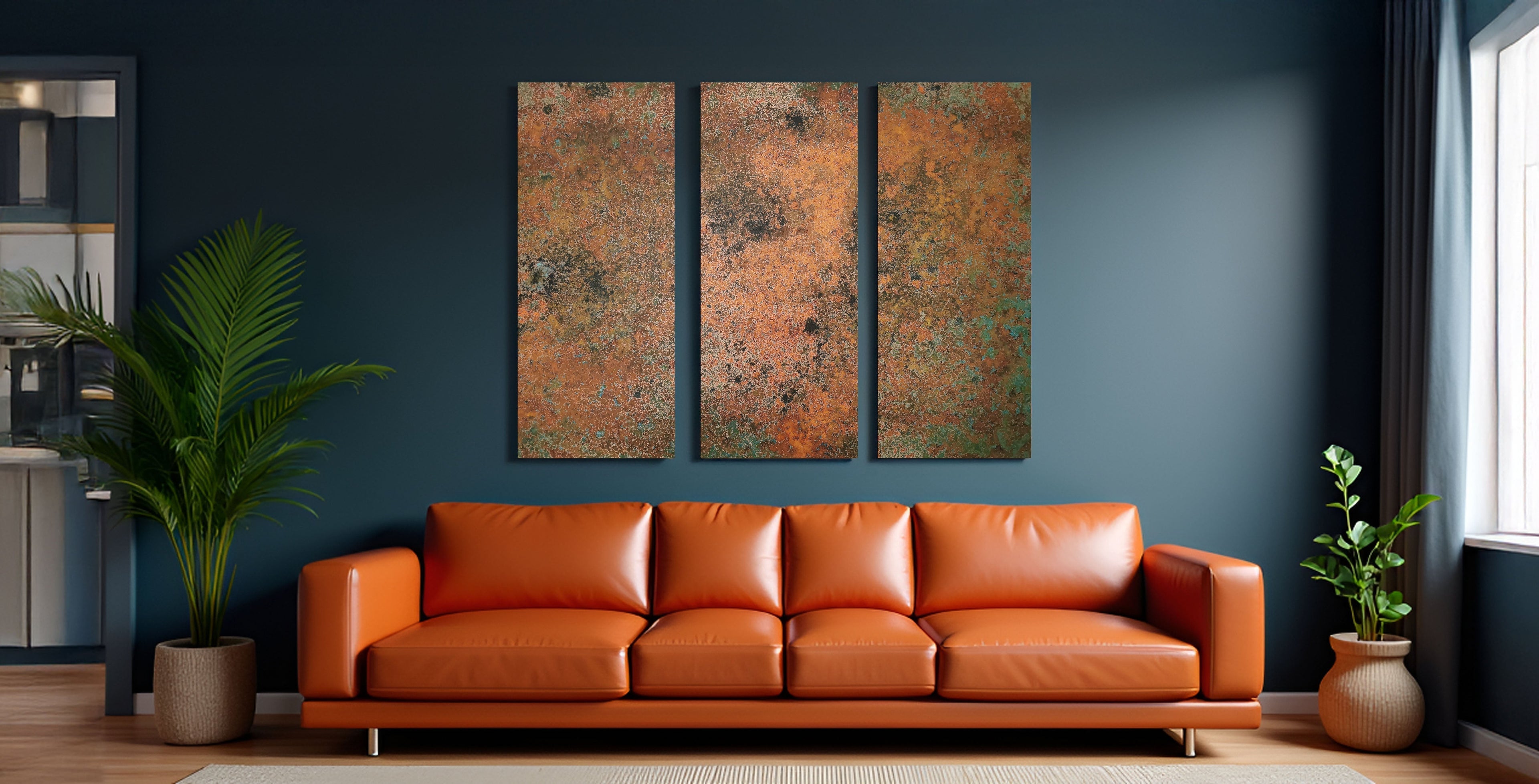 Dreiteiliges Kupfer Wandbild Mystic Copper Nebula über orangem Sofa im modernen Wohnzimmer